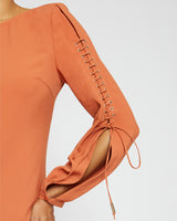 ARIES Long Sleeve Shift Dress with Grommet Detail