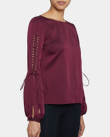 LIVI Long Sleeve Top with Grommet Detail in Fluid Crepe.