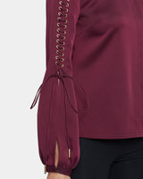 LIVI Long Sleeve Top with Grommet Detail in Fluid Crepe.