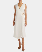 URSA Sleeveless Faux Wrap Dress with Metal Buckle in Stretch Crepe.