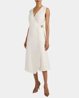 URSA Sleeveless Faux Wrap Dress with Metal Buckle in Stretch Crepe.