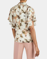 JOYCE Mock Neck Blouse with Short Cape Sleeves in Floral Georgette