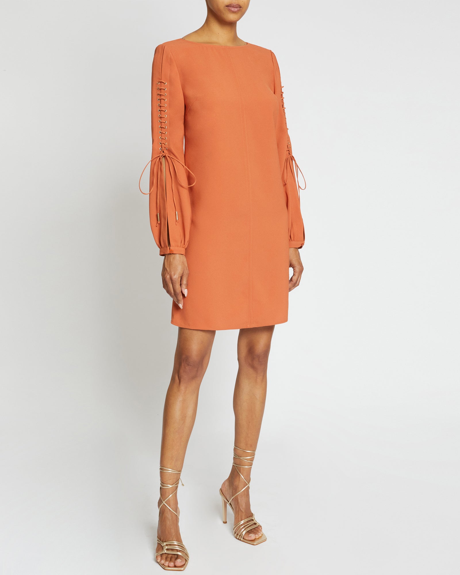 ARIES Long Sleeve Shift Dress with Grommet Detail – Santorelli ARIES Long Sleeve Shift Dress with Grommet Detail – Santorelli