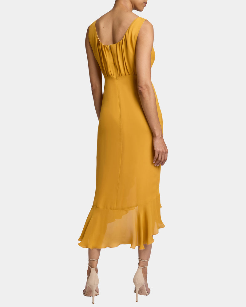 RINA Sleeveless Dress with Hi-Lo Ruffled Skirt Panel and Top Tucks in Silk Georgette
