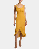 RINA Sleeveless Dress with Hi-Lo Ruffled Skirt Panel and Top Tucks in Silk Georgette