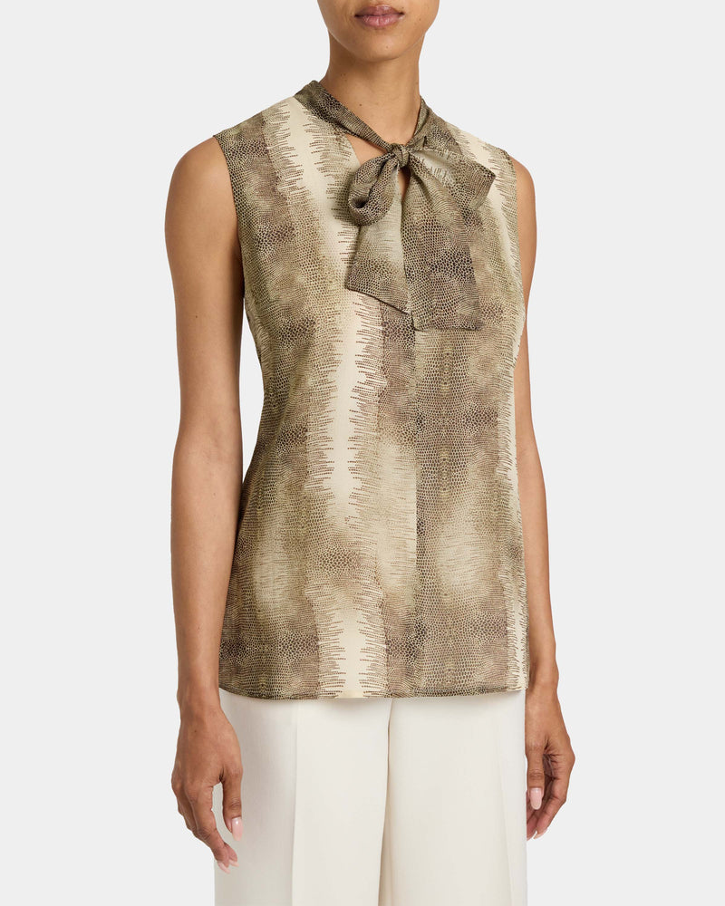 TECA Sleeveless Tie Neck Blouse in Animal Printed Georgette