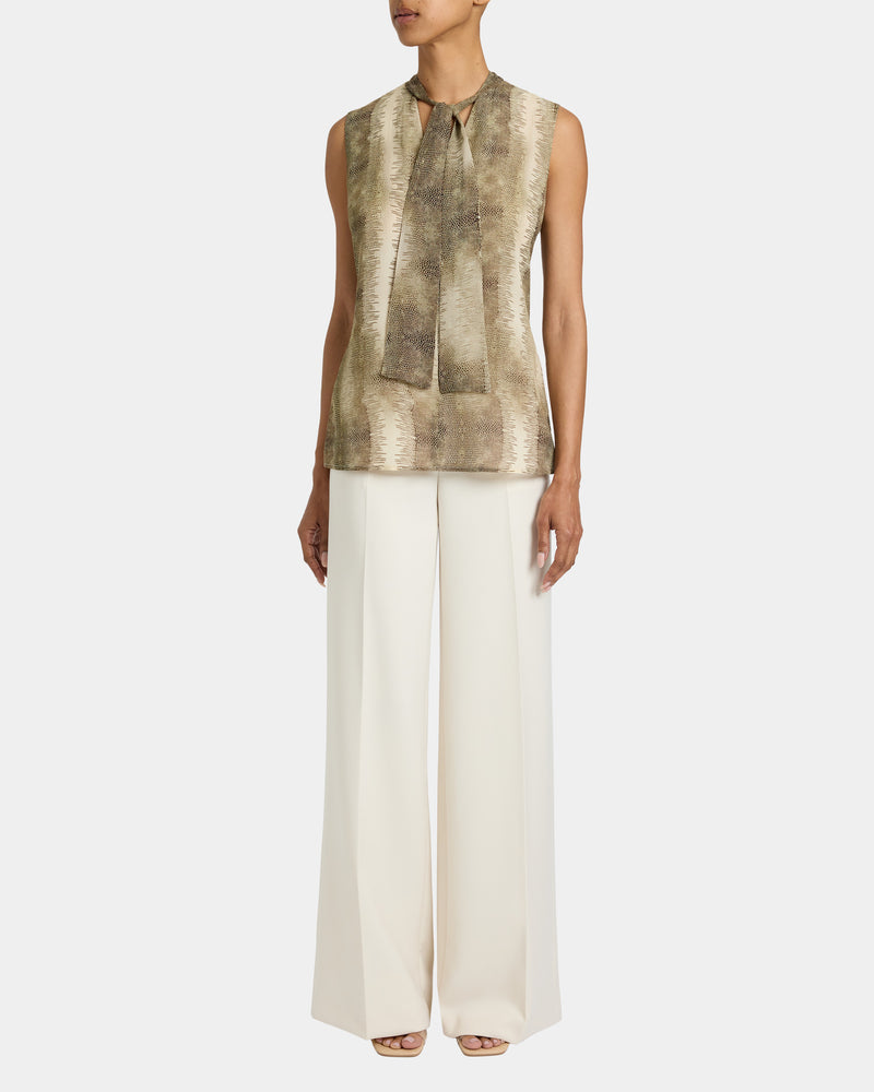 TECA Sleeveless Tie Neck Blouse in Animal Printed Georgette