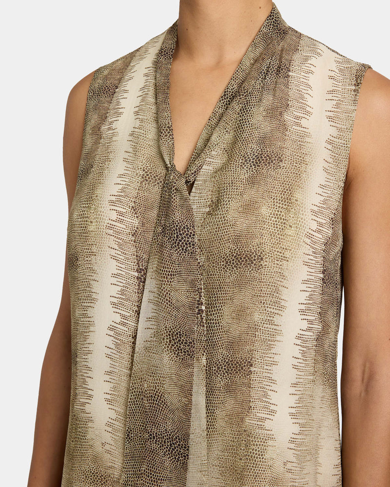 TECA Sleeveless Tie Neck Blouse in Animal Printed Georgette