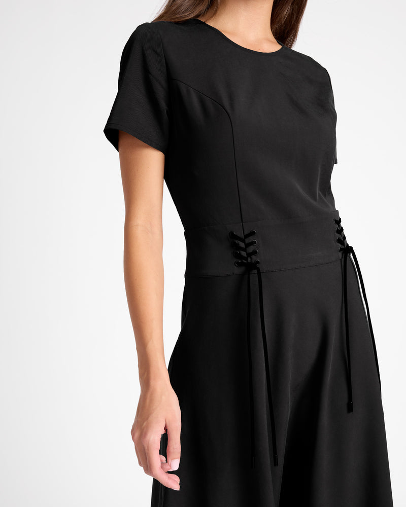 short sleeve leather dress Never A Wallflower This little number features a ruched waist detail and puff sleeves for a touch of femininity Womens O-Neck Short Sleeve Real