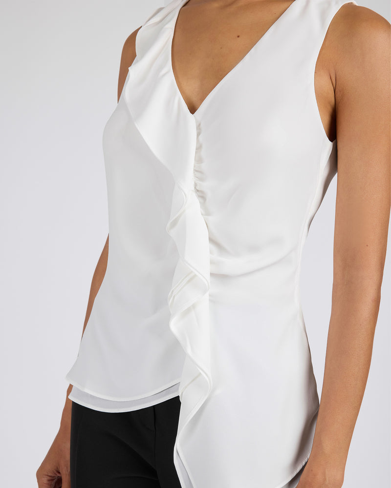 TYRA Sleeveless Top with Asymmetric Ruffles